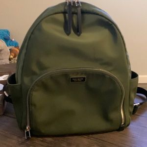 Gently loved Kate Spade olive green backpack. $50